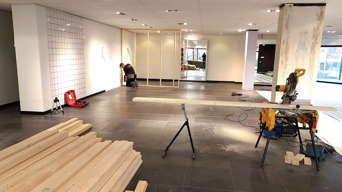Flooring work inside a home during renovation